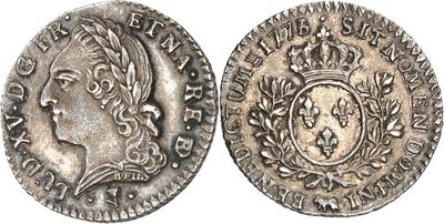 une pièce d'argent surmontée d'une couronne