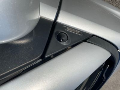 a close up view of a car door handle