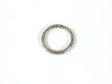 a close up of a silver ring on a white surface