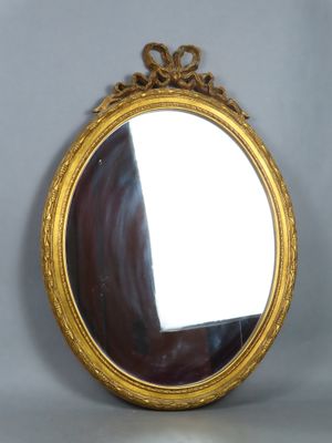 a mirror that is sitting on a table
