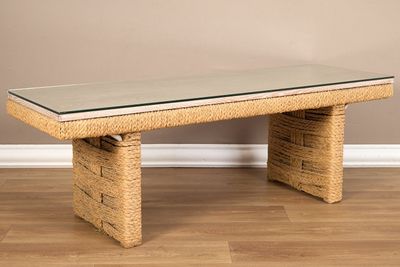 an image of a coffee table with a glass top on a wooden floor