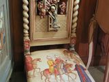 a chair that has a clock on it in a room