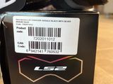 a box with a helmet on it sitting on a table