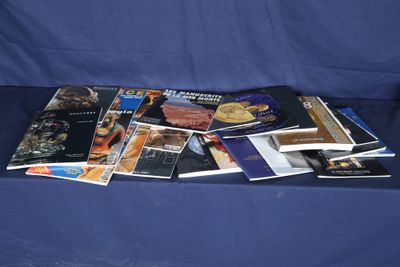 a lot of books that are on a blue cloth