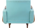 an upholstered blue chair with studded arms and wooden legs