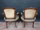 pair of antique chairs with upholstered back and arms