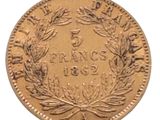 l'image d'une pièce d'or ornée d'une couronne