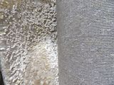 a close up of a piece of fabric with a hole in it