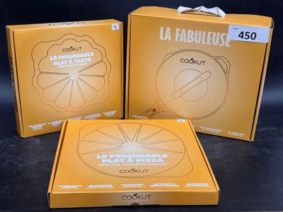three boxes of coconut flavored cookies are sitting on a table