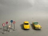 three toy cars that are sitting next to each other