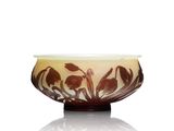 bowl with a brown and white design on it on a white surface
