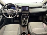 the interior of a car with a steering wheel, dashboard, and dashboard controls