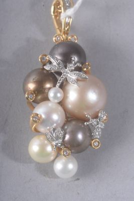 an image of a pendant with pearls and diamonds on a white background