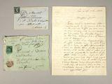 two old letters and a piece of paper on a table