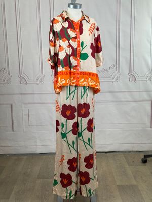 an image of a mannequin dressed in a floral print outfit