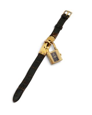 a close up of a watch with a padlock on it