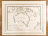 an old map of australia and new zealand in a wooden frame