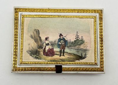 tableau représentant un homme et une femme debout devant une montagne