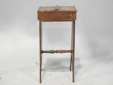 an old wooden table with a drawer on top of it