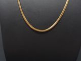 a gold chain necklace on a mannequin mannequin mannequin mannequin mannequin mannequin mannequin mannequin manne