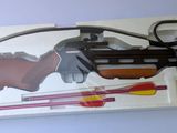 a box with a toy gun and other items in it