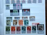 an image of a picture of a collection of stamps on a table