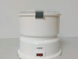 a white machine that is sitting on a table
