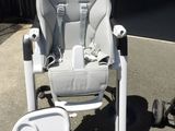 a baby stroller that is sitting on the ground