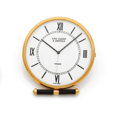 two clocks with roman numerals on each of them