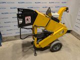 a yellow machine that is sitting in a room