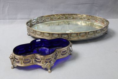 two trays that are sitting next to each other on a table