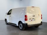 a white van that is parked in a room