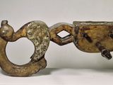 a metal object that is sitting on a white table
