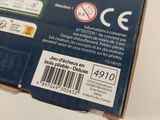 the back of a box with a picture of a man playing chess