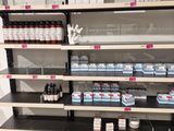 many shelves with various products on them in a store