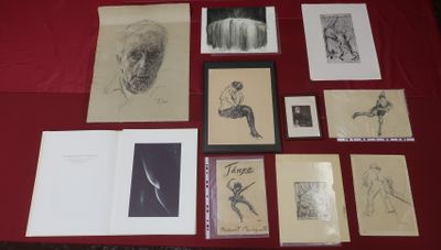 a red table with a bunch of drawings on it