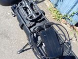 a motorcycle that is parked on the side of the street