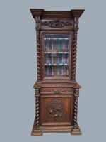 Buffet à deux corps en chêne mouluré et sculpté ouvrant en p…