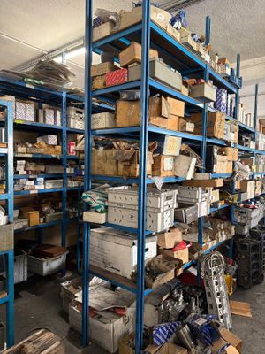 lots of boxes and boxes on the shelves in the warehouse