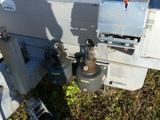 a close up view of a machine that is on the ground