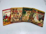four children ' s books are lined up on a white surface