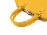 the small yellow bag is open and ready to be carried