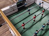 a foosball table in the middle of a room