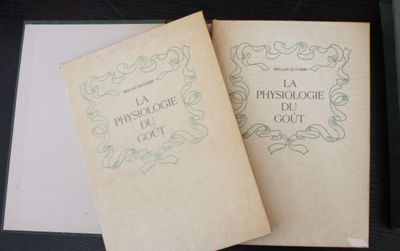 two books are sitting on top of a table next to each other
