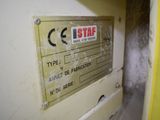 a sign on the wall of a building that says stop