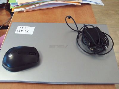 a computer mouse and a mouse pad on a desk
