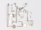 a lot of silver items that are on a table