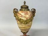pair of antique marble urns with brass handles on marble bases