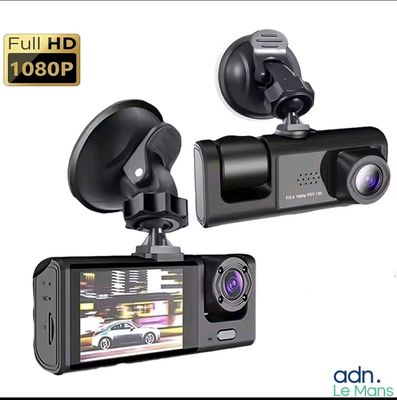 two cameras are shown with a car camera attached to them