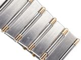 a close up of a watch bracelet on a white surface